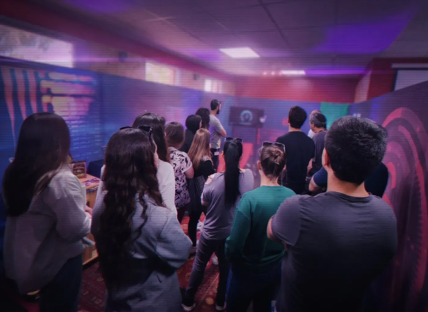 A team solving a puzzle in the escape room