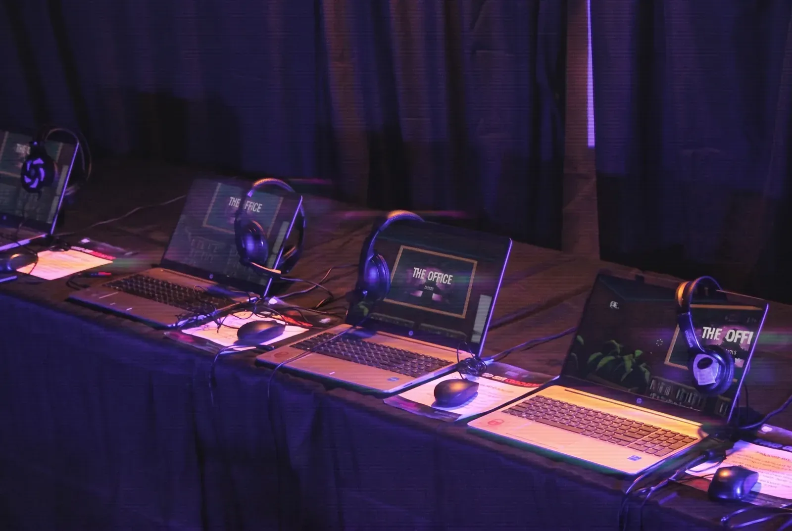 A row of gaming stations at an event